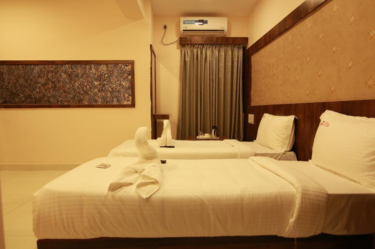 Hotel Apple Suites Bangalore Bagian luar foto
