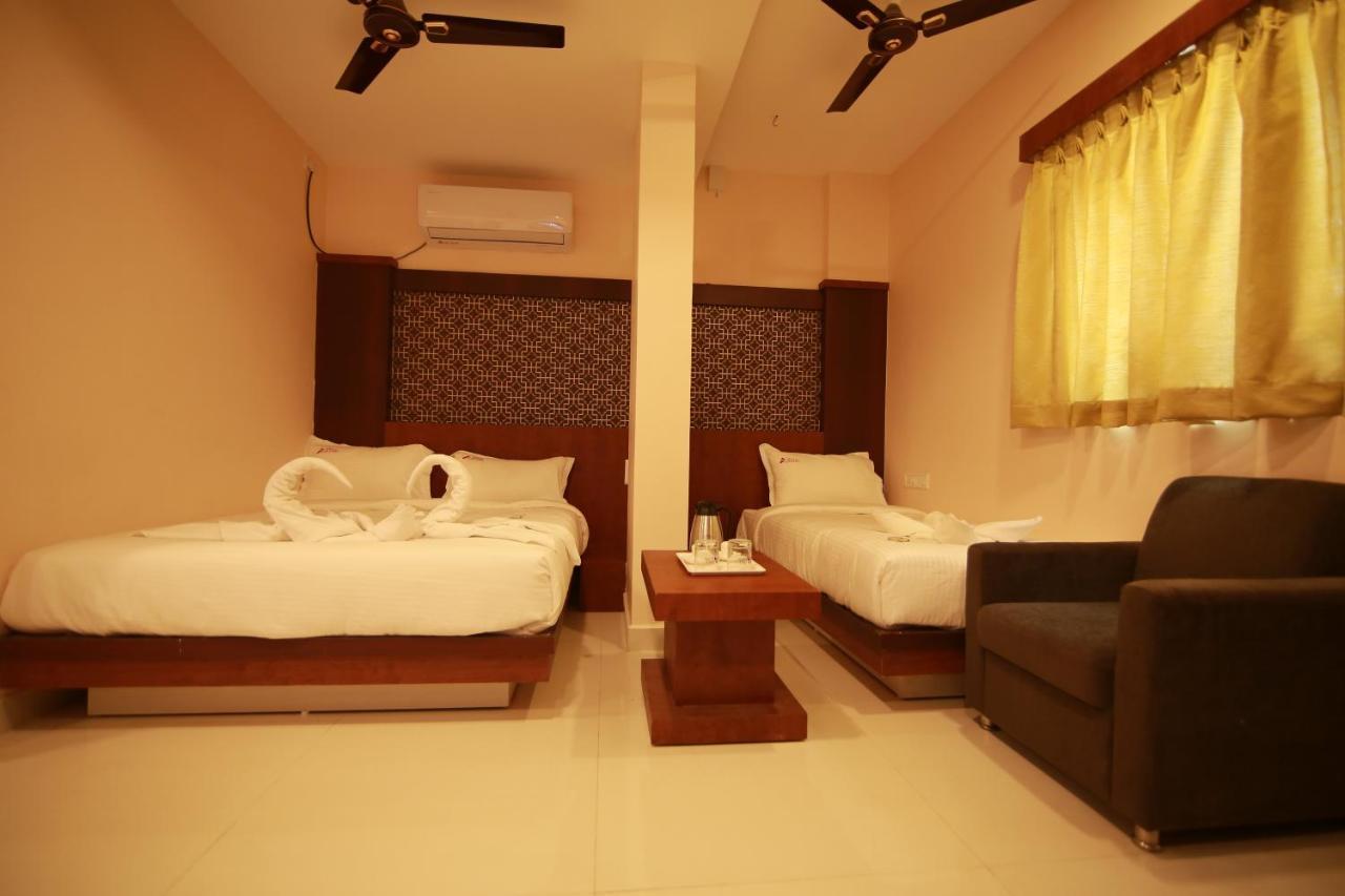 Hotel Apple Suites Bangalore Bagian luar foto