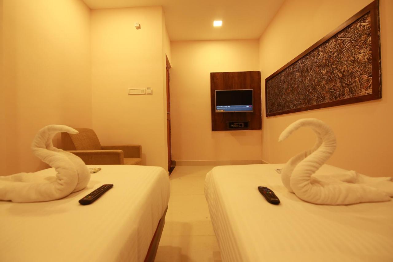 Hotel Apple Suites Bangalore Bagian luar foto