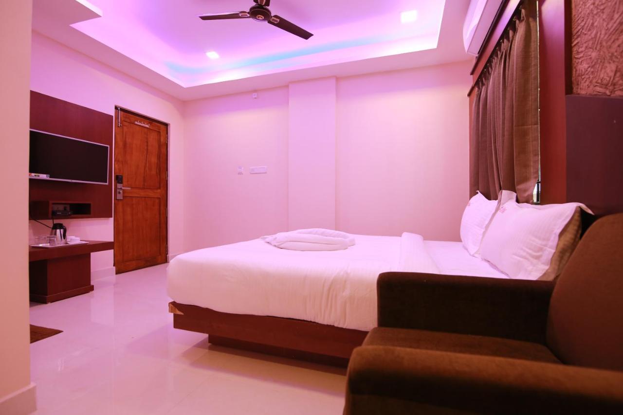 Hotel Apple Suites Bangalore Bagian luar foto