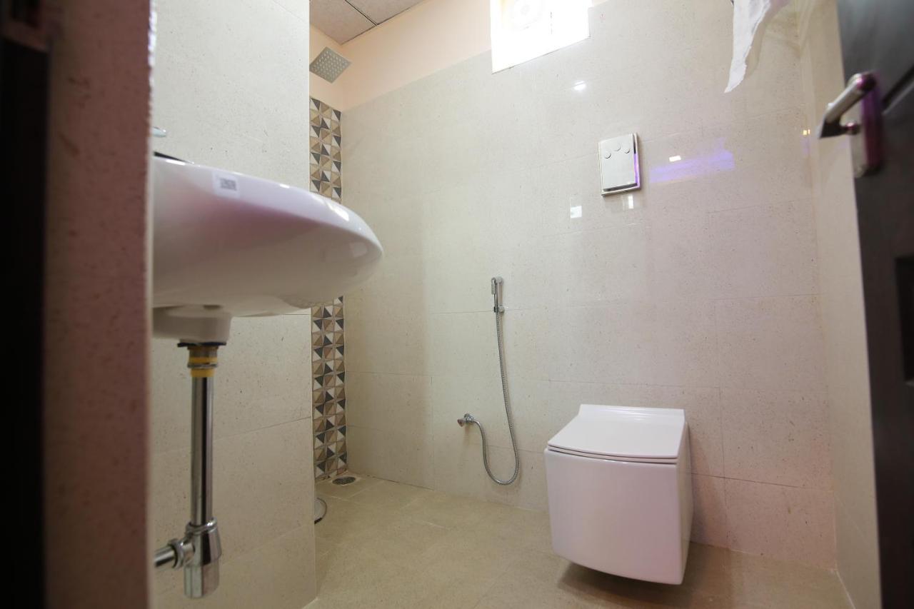 Hotel Apple Suites Bangalore Bagian luar foto