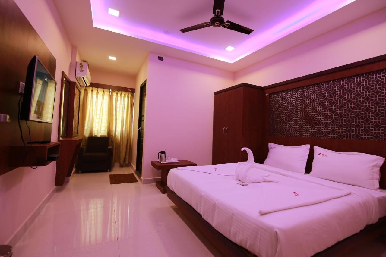 Hotel Apple Suites Bangalore Bagian luar foto