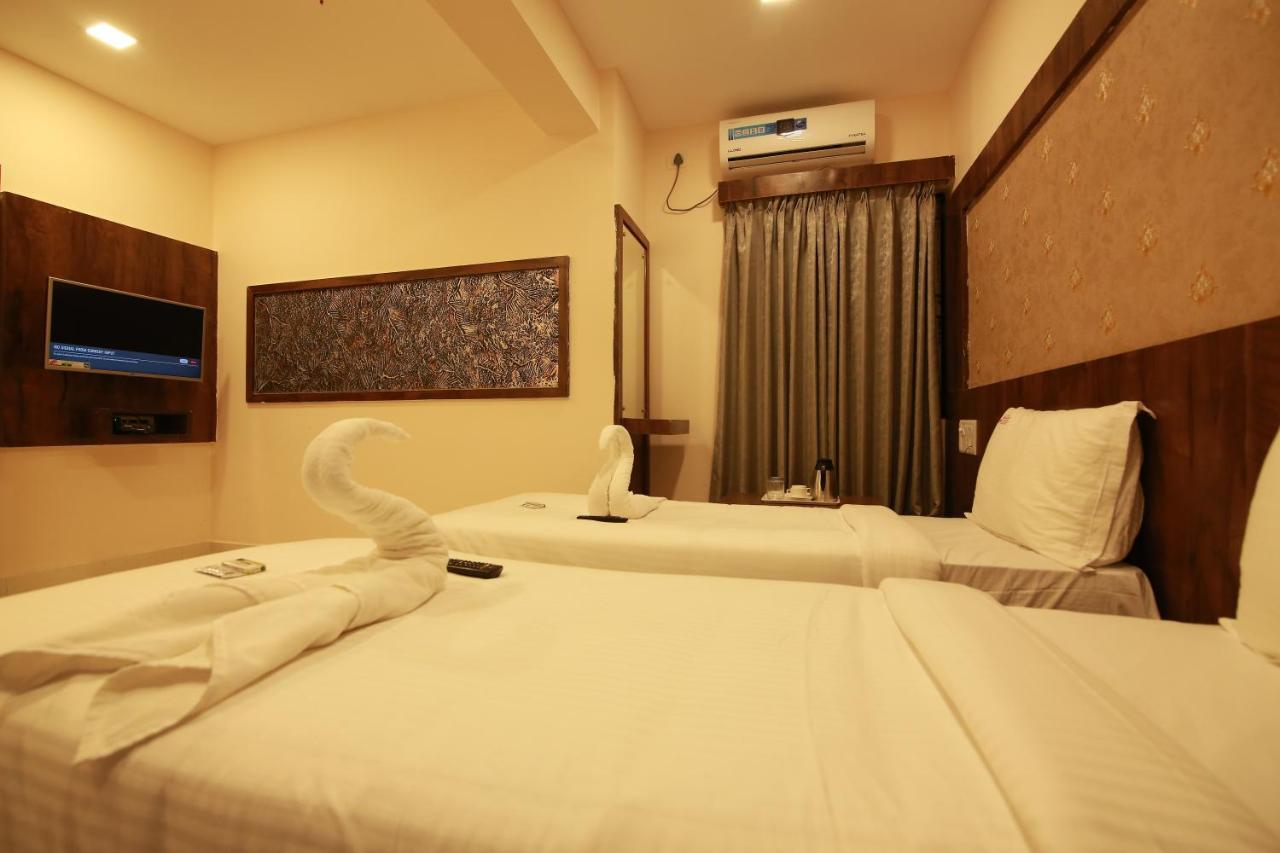 Hotel Apple Suites Bangalore Bagian luar foto