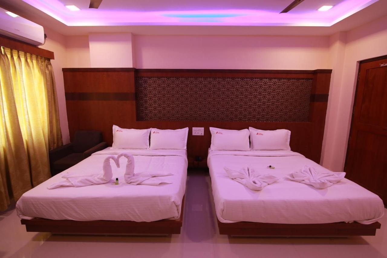 Hotel Apple Suites Bangalore Bagian luar foto