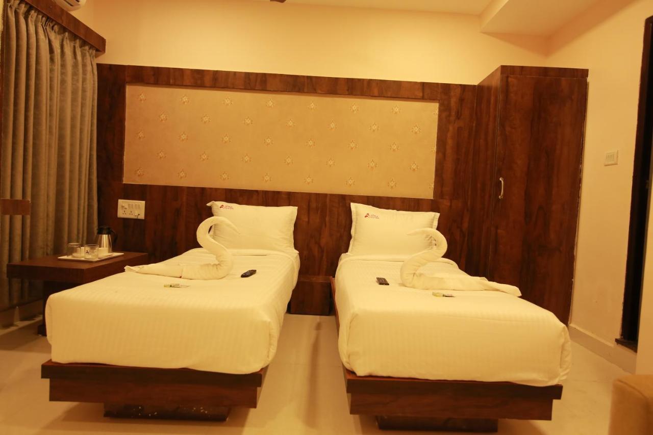 Hotel Apple Suites Bangalore Bagian luar foto
