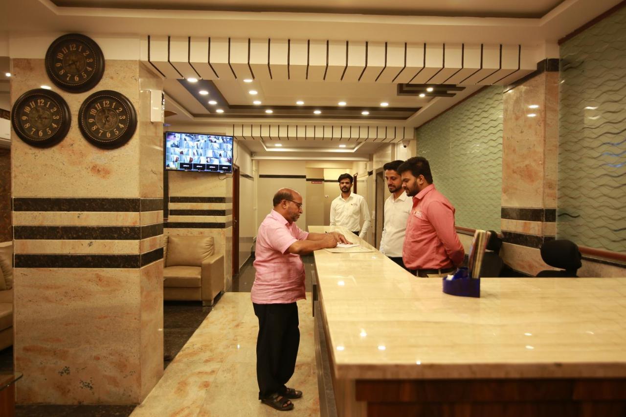 Hotel Apple Suites Bangalore Bagian luar foto