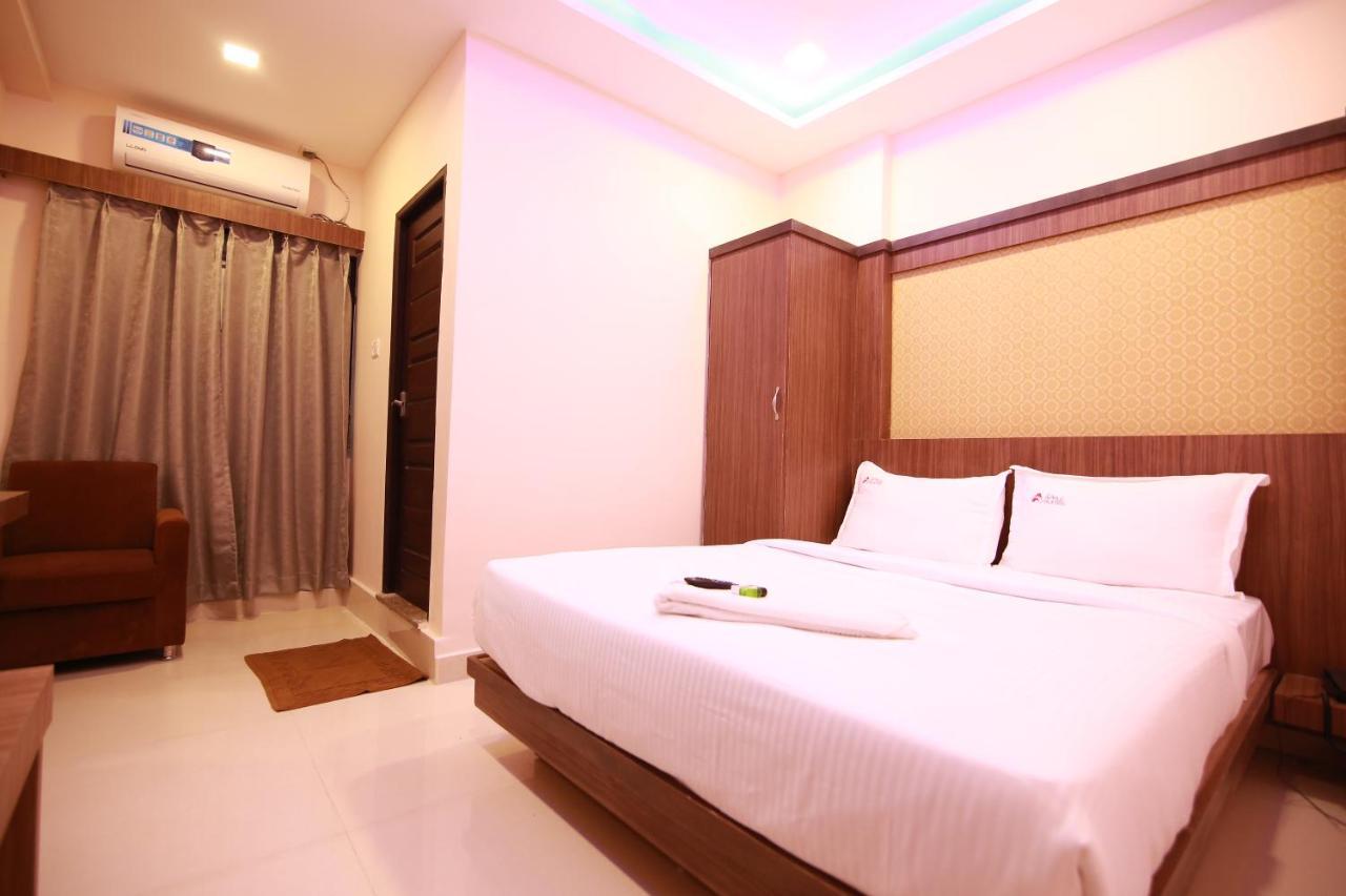 Hotel Apple Suites Bangalore Bagian luar foto