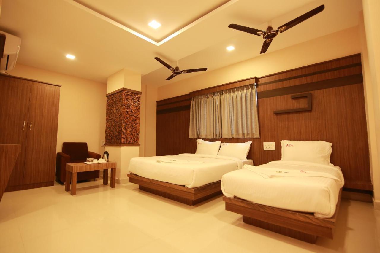 Hotel Apple Suites Bangalore Bagian luar foto
