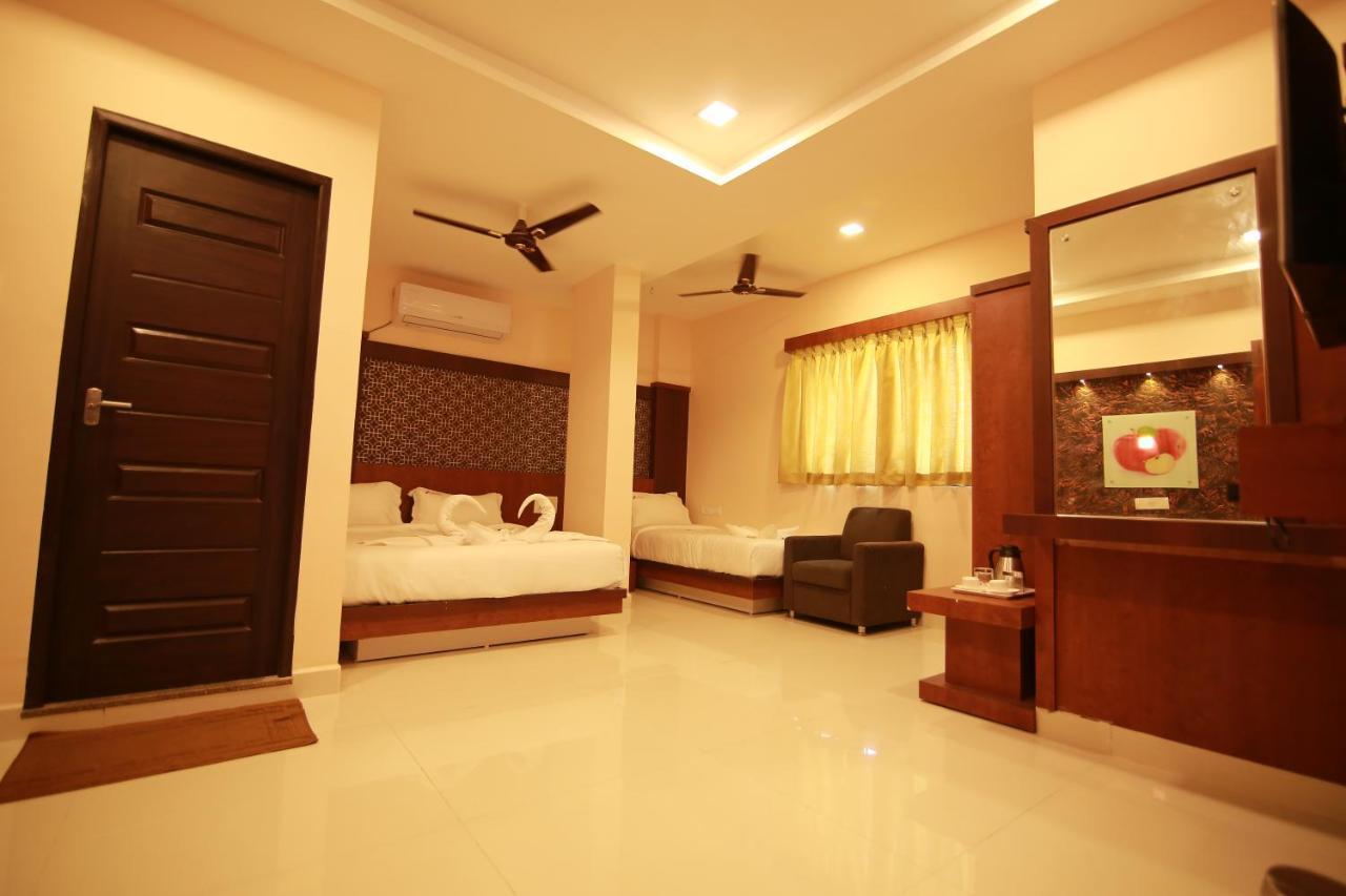 Hotel Apple Suites Bangalore Bagian luar foto