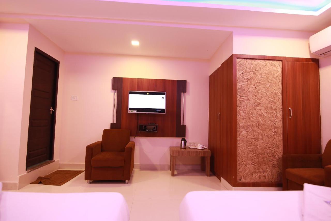 Hotel Apple Suites Bangalore Bagian luar foto